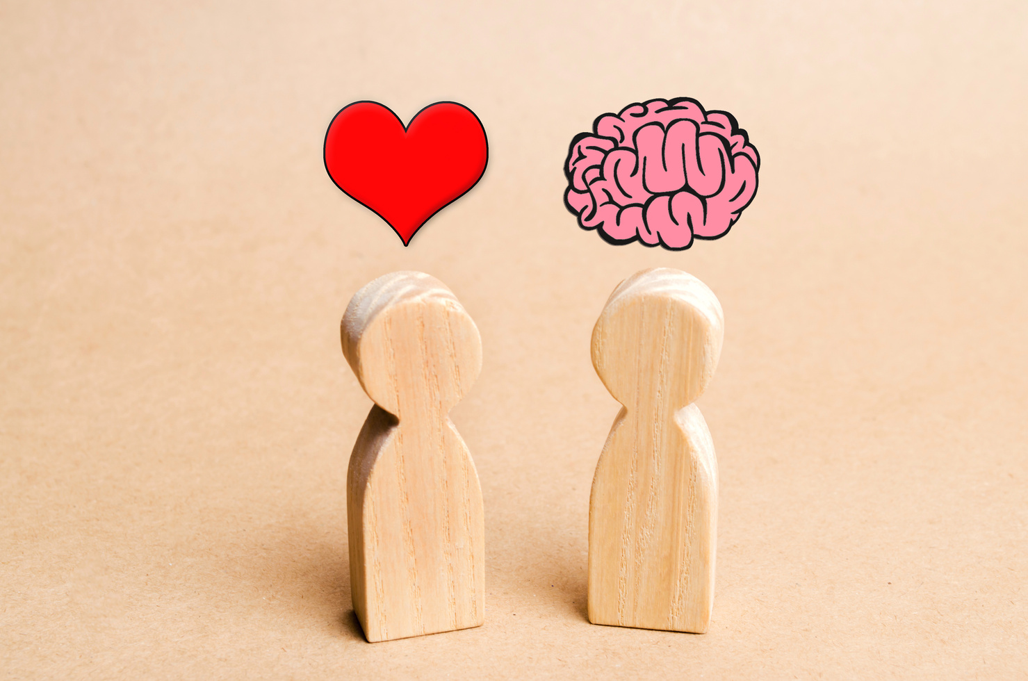 Heart vs Mind or brain. Concept of mind against love. Balance between irrational love and reason. Family psychology. Problems in relations